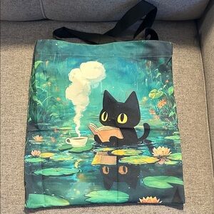 Black Cat Tote Bag with Green and Blue Design